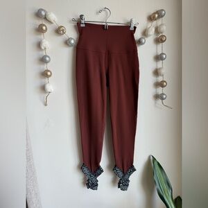 Beyond Yoga Maroon Cropped Pants with Black Geometric Hem